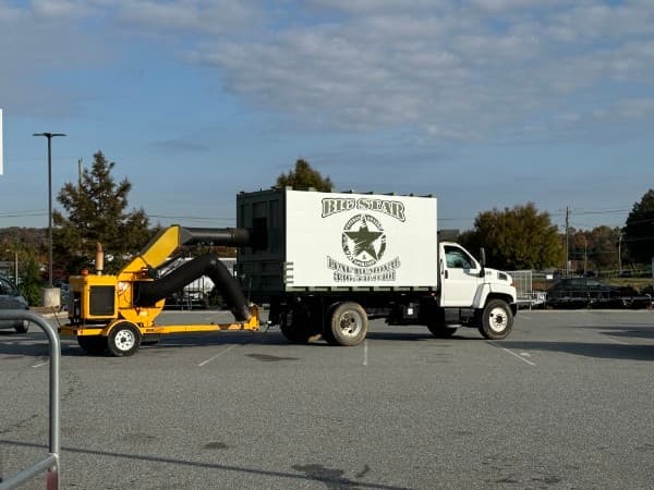 Big Star Property Solutions truck and leaf vacuum equipment in Greensboro, NC